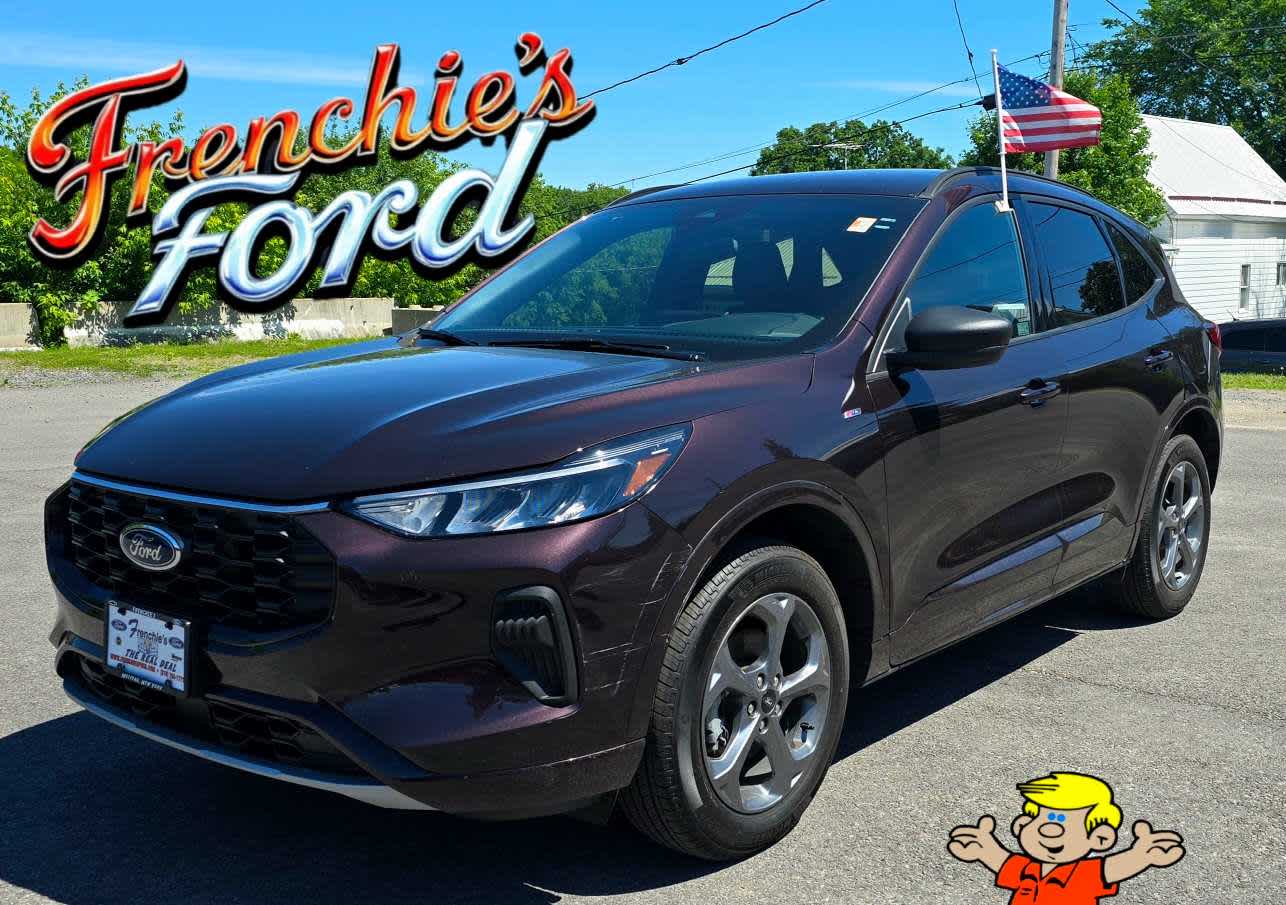 2023 Ford Escape ST-Line in Cinnabar Red — front three-quarter view